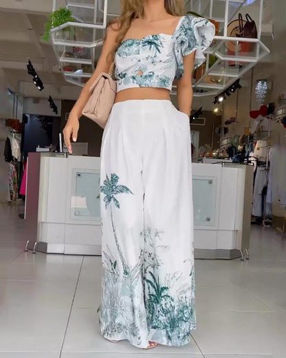 Printed two-piece set with one-sleeve ruffle sleeve cropped top & pants