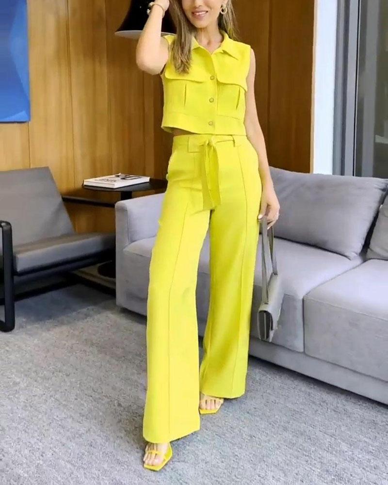 Stylish two-piece suit with sleeveless cropped shirt & trousers