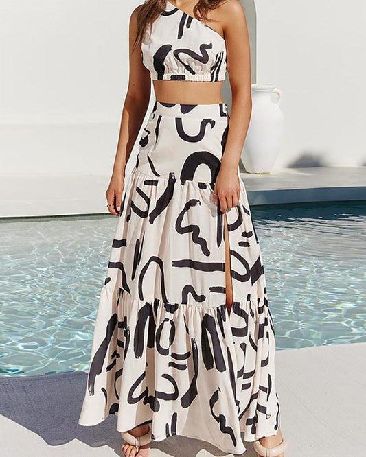 Two-piece set with one-shoulder sleeveless top and slit skirt