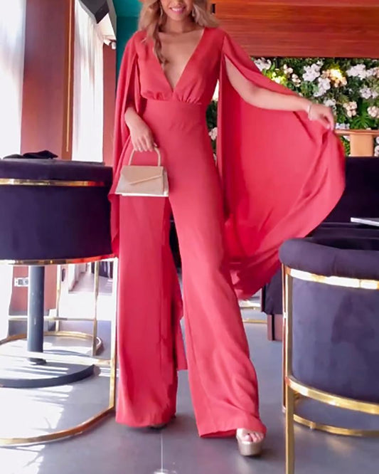 Stylish open-back jumpsuit with cape sleeves